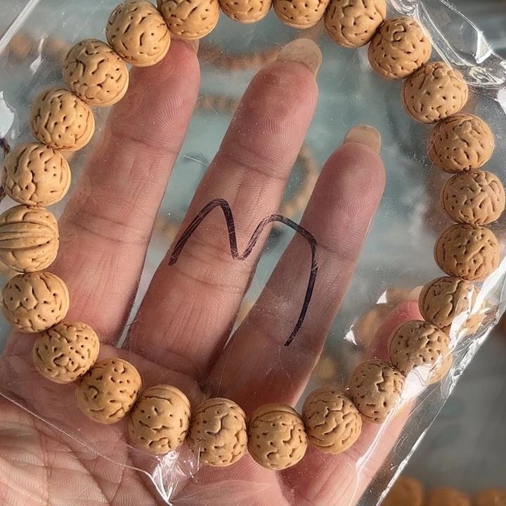 手串桃核野生小桃核手持，