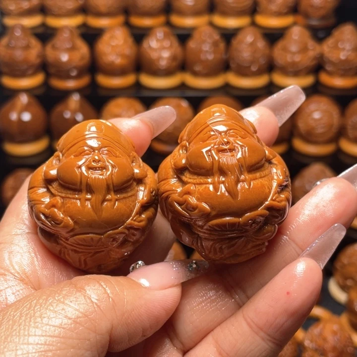 橄榄核把件妞****店橄榄雕刻