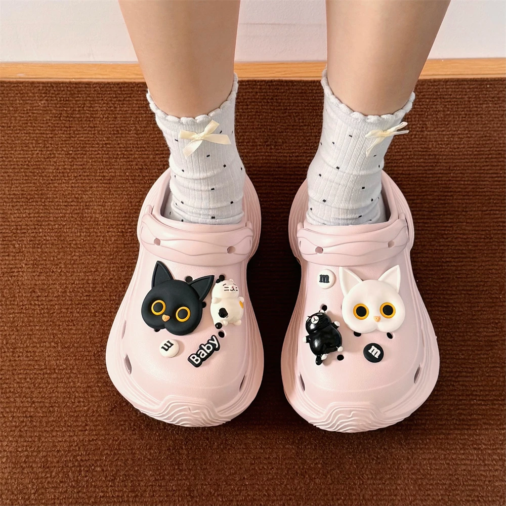 细细条 eva户外穿增高防滑夏季沙滩凉拖女新款个性黑白小猫洞洞鞋