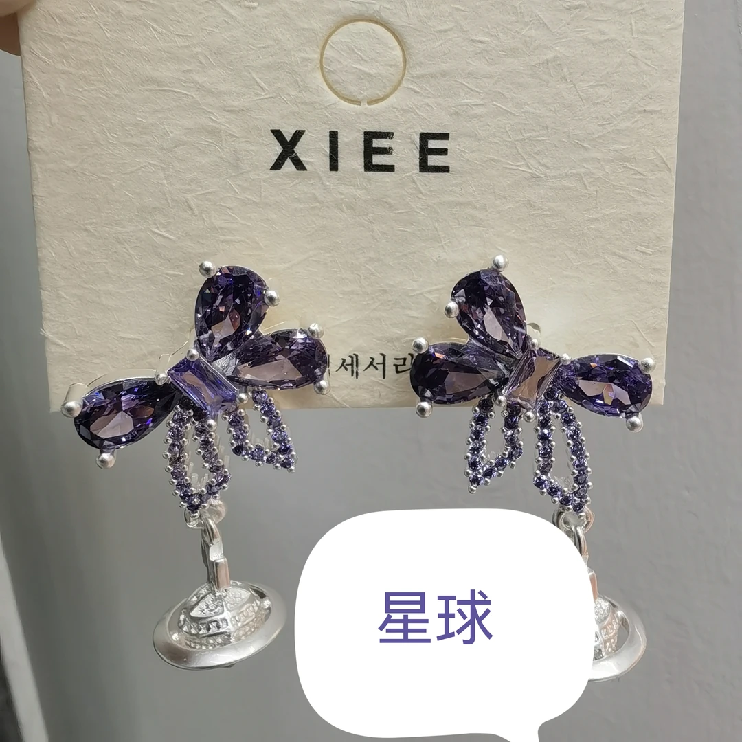 E527紫色蝴蝶结闪闪星球耳钉耳饰