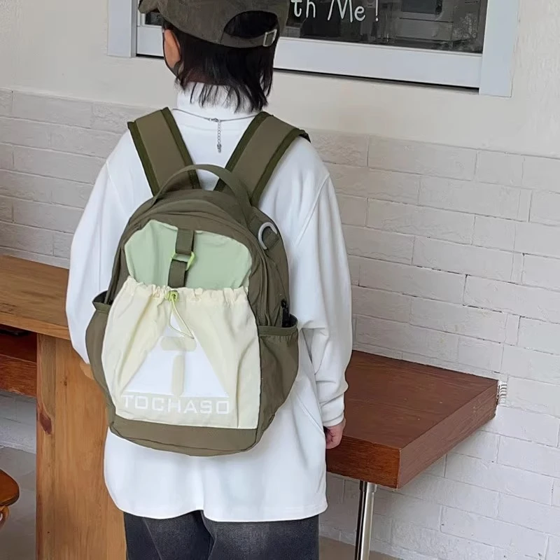 幼儿园宝宝背包儿童休闲简约中小班轻便双肩包男女童拼色时尚书包