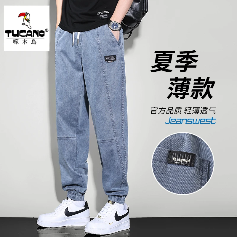 啄木鸟牛仔裤男款潮牌束脚裤宽松时尚休闲夏季薄款运动长裤子男士