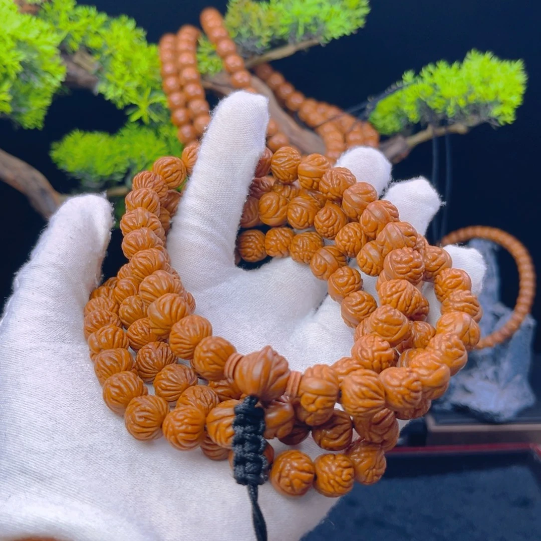 嘚***啵桃核吊坠野生桃核