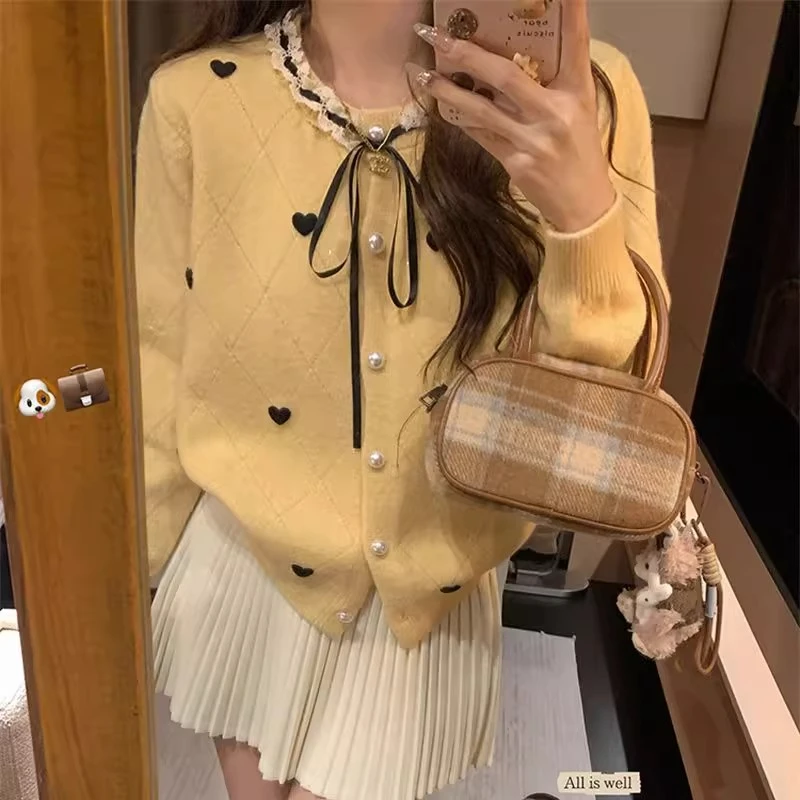 韩系爱心蕾丝圆领蝴蝶结单排扣针织开衫女秋冬新款减龄上衣外套潮