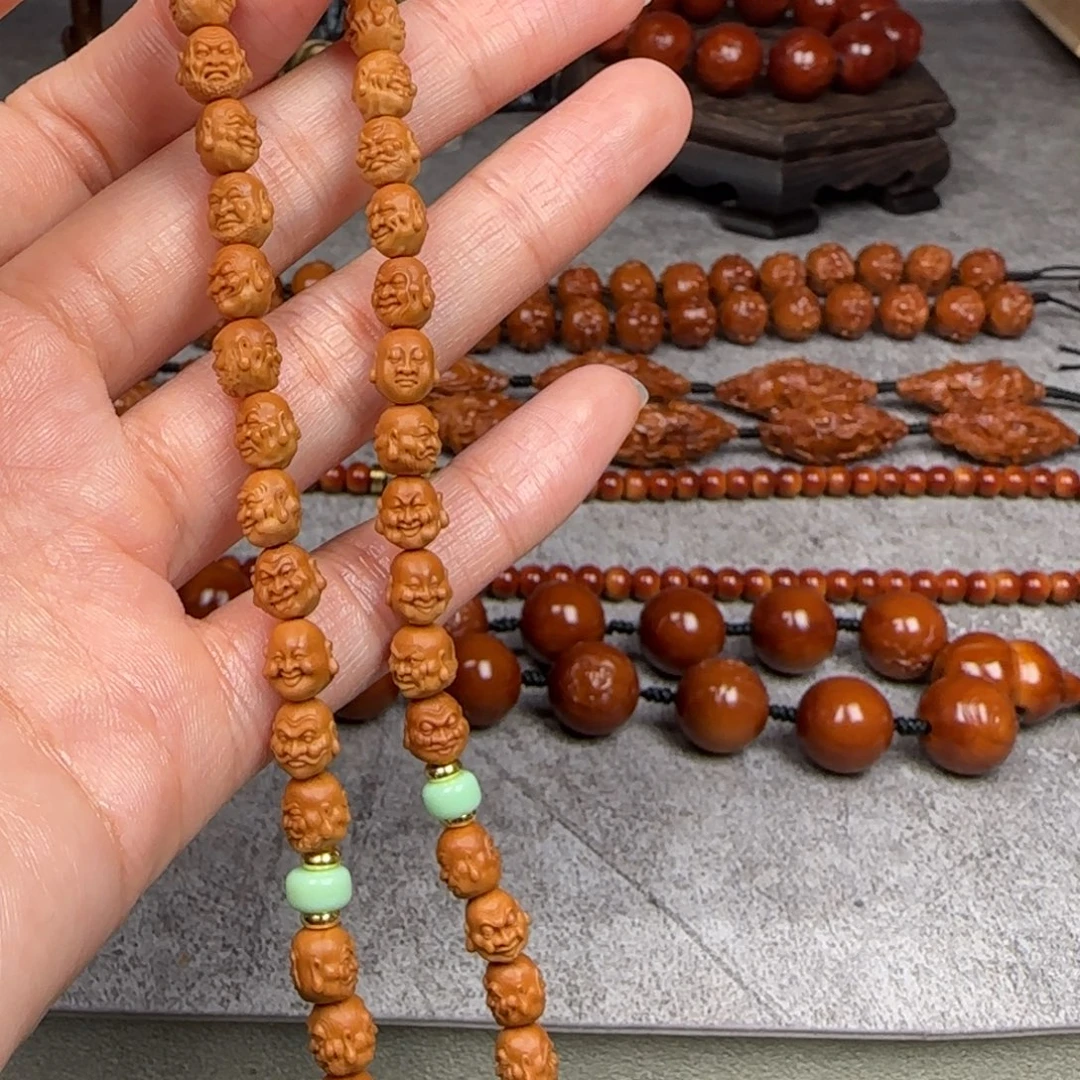 橄榄核手串/手链0.7尺寸双面核尖108罗汉手持
