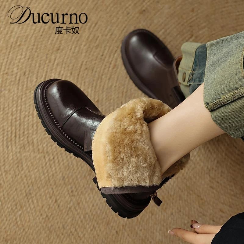 度卡奴真皮雪地靴厚底短靴女秋冬加绒保暖东北大棉靴英伦风马丁靴