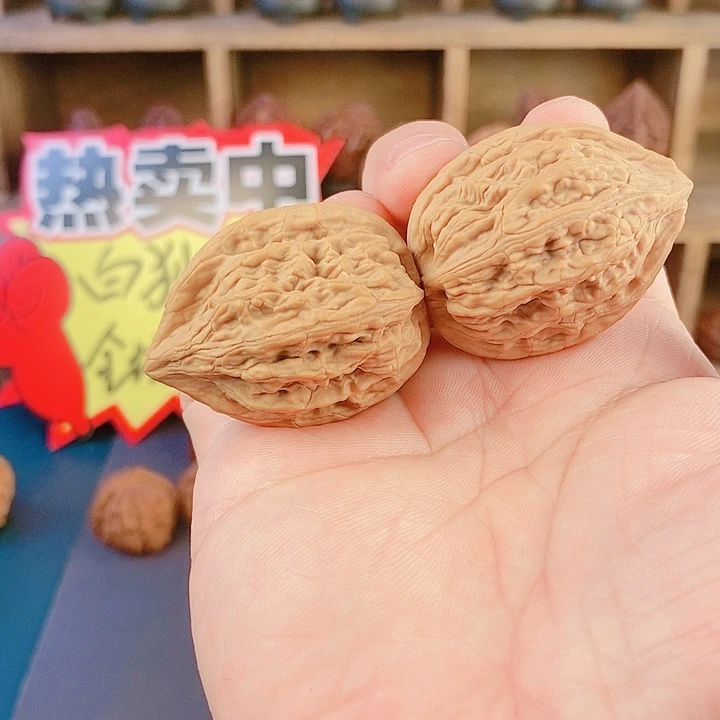 文玩核桃吊坠87天眼鸡心