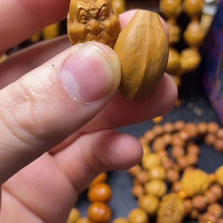 沧***吟橄榄核手串啦啦啦咯