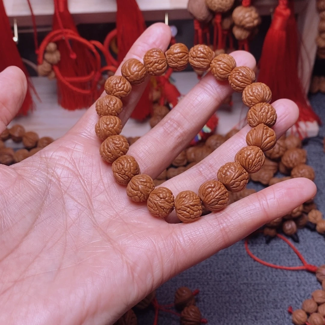 輕***6桃核吊坠桃枭手串