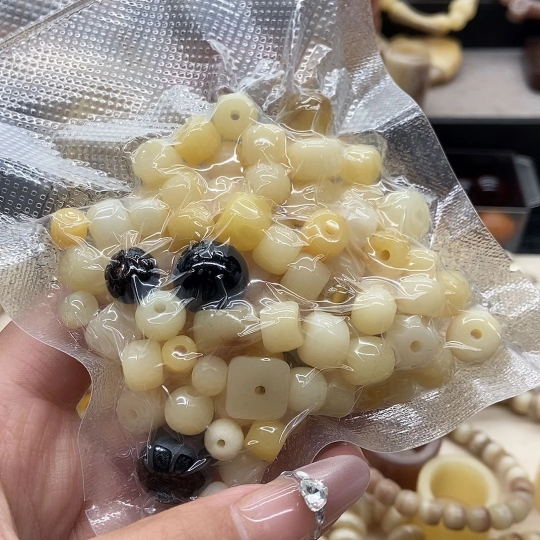 驼骨手串/手链散珠一包，包含有个别瑕疵珠