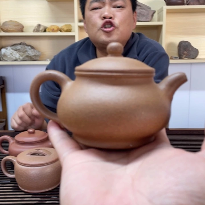 紫砂茶壶阜****仓降坡潘壶