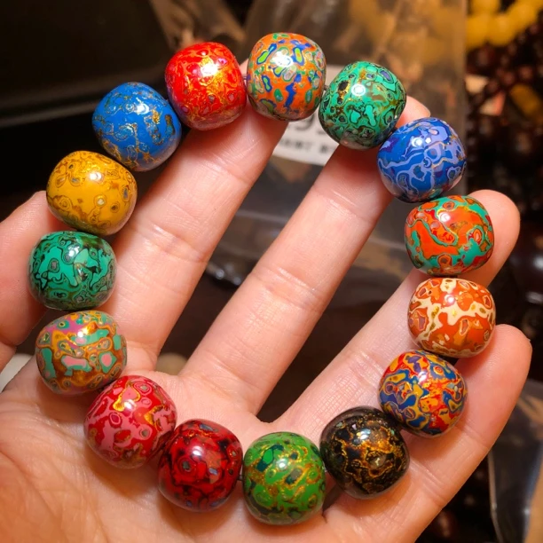 非物质文化遗产大漆珠手串尺寸13.8/14.5/mm16颗重量：38克左右