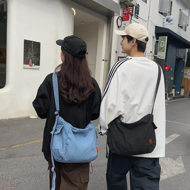 单肩包男女2025新款日系简约牛仔帆布包睿营斜挎包大学生邮差包小