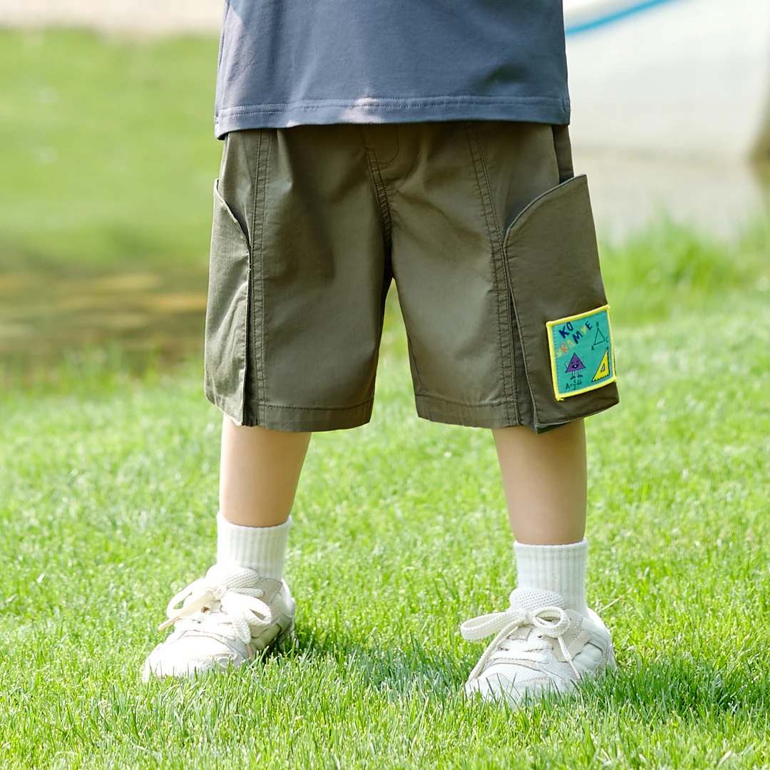 酷娃米夏季新款儿童裤子中小男女童时尚口袋卡通工装中裤70437