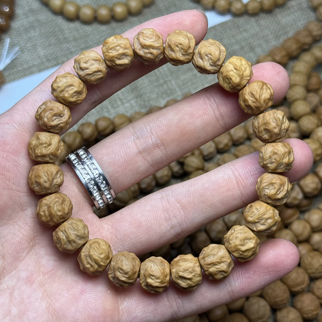 【程程出品】猴头核桃龙蛇之变雕刻手串