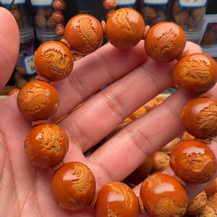 苏***装橄榄核手串/手链1.75正圆云中龙