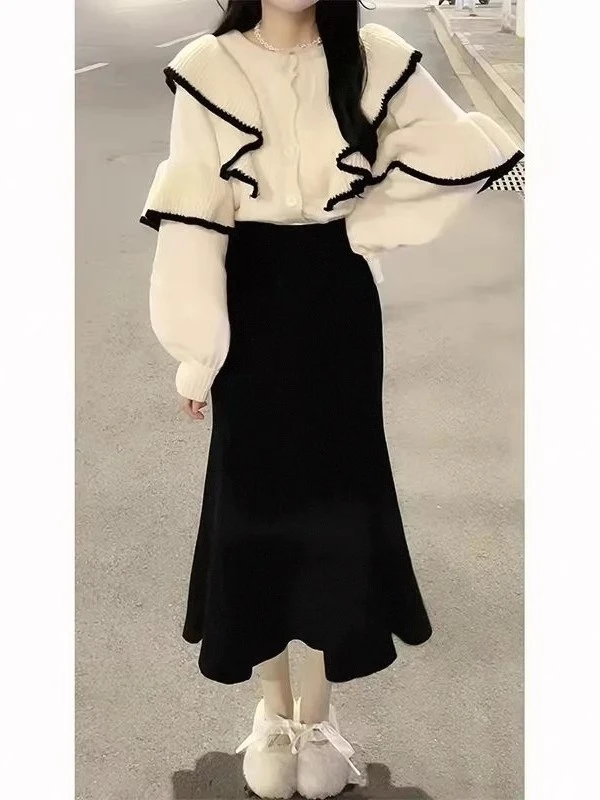 早春一整套女装2025新款韩版时尚设计感针织毛衣高腰鱼尾裙两件套