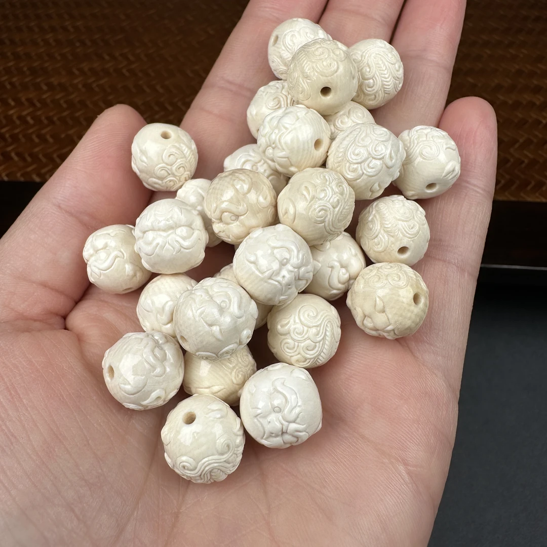 A293天然猛犸牙 貔貅珠上下孔12mm随机一个支持鉴定假一罚四