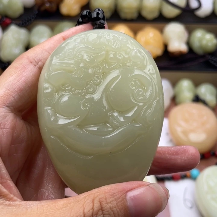李***石材古青石手把件