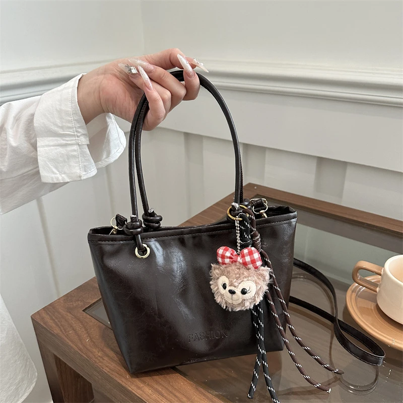 2025春季新款休闲简约时尚复古质感潮纯色通勤单肩斜挎水桶手提包