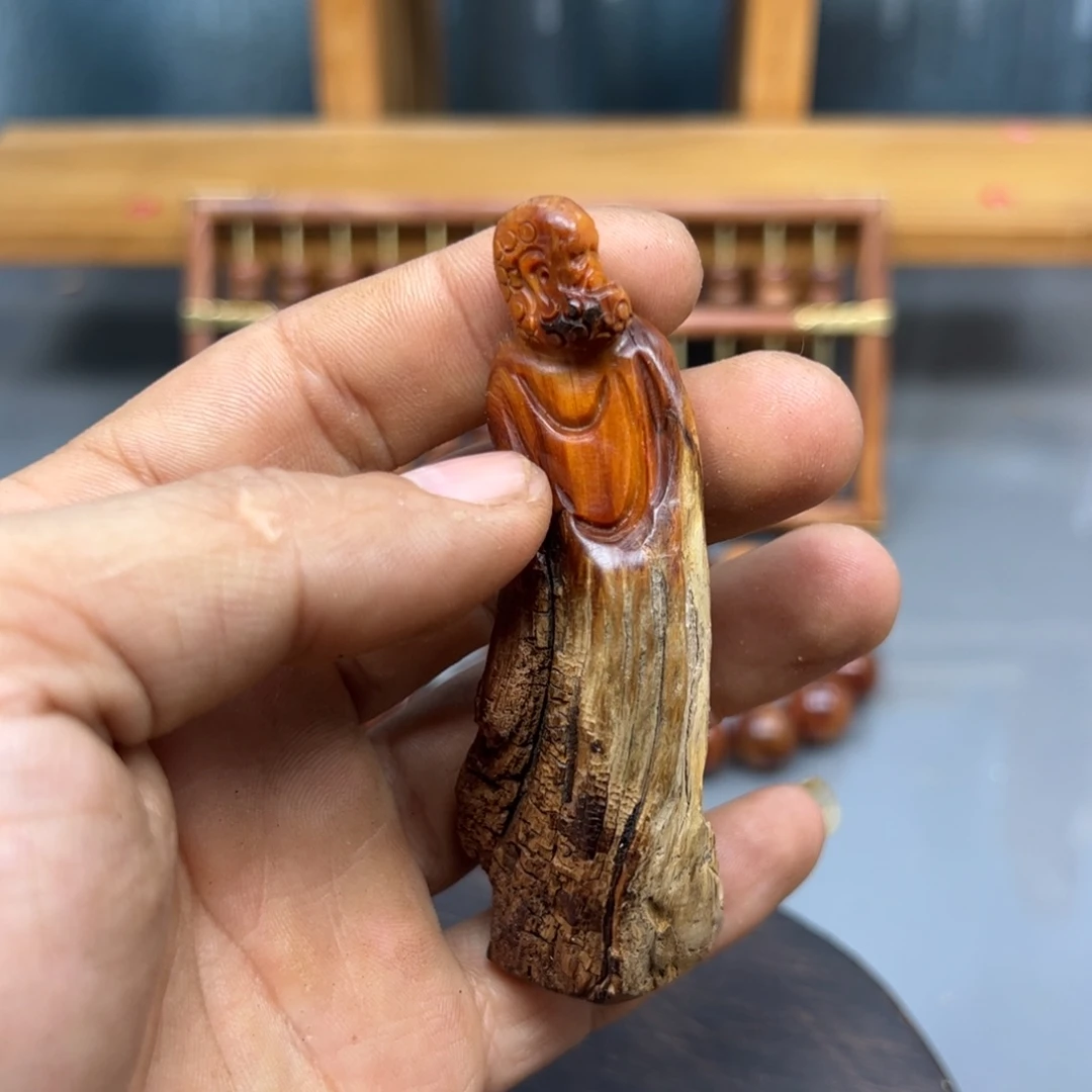 贝***y木崖柏木摆件手把件