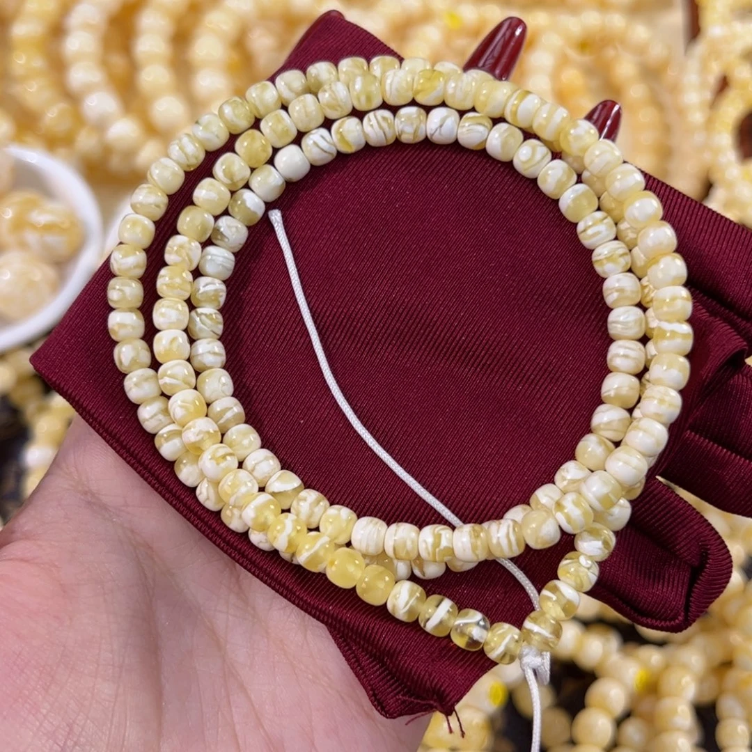 琥珀未镶嵌手串金漆白虎皮108 5.6m