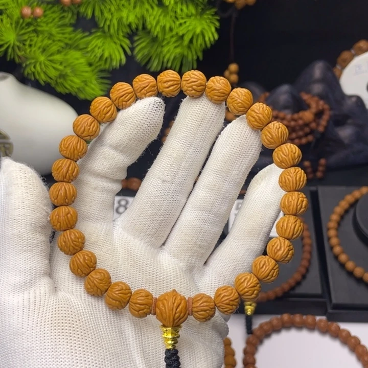 菩***树吊坠桃核小金豆1.0