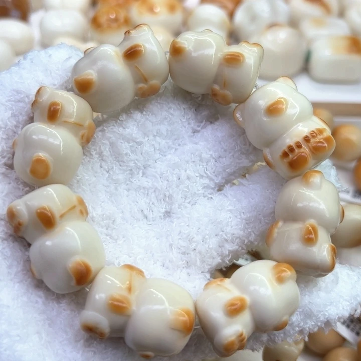 白玉菩提把件65 象牙果原果雕刻炭烧背包爱心熊