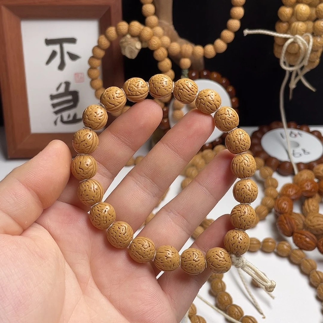 手串桃核12左密纹金豆