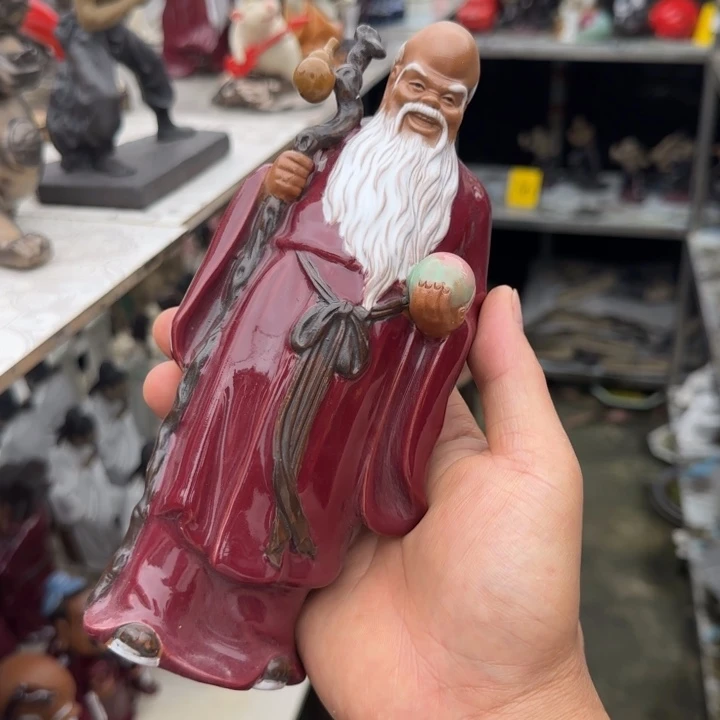 石湾公仔衬托盆景漂亮