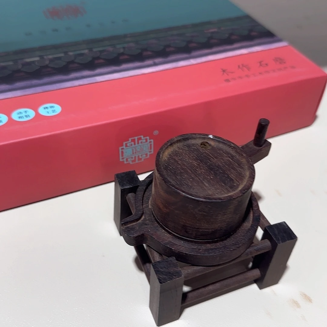 紫檀木类端景台血檀石磨