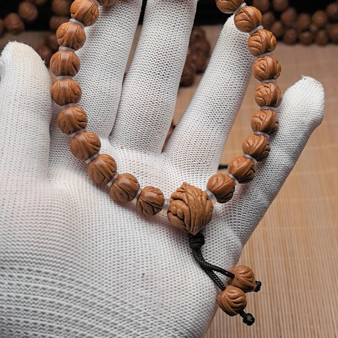 桃核吊坠小龙纹手持