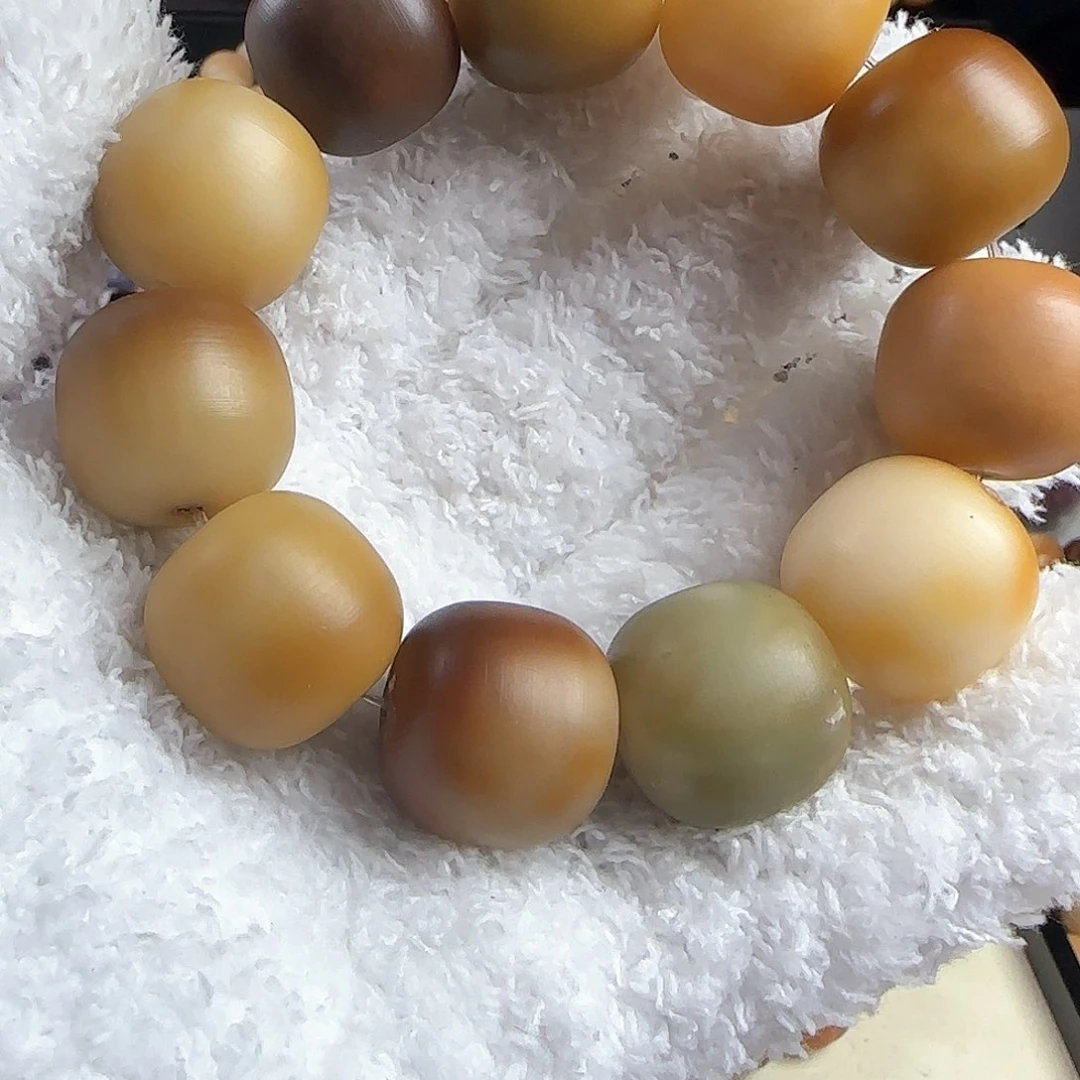 菩提根/象牙果手串阿***优瑕疵卡20手串一条