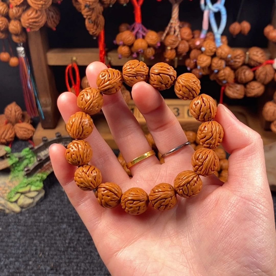 吊坠桃核桃枭手串