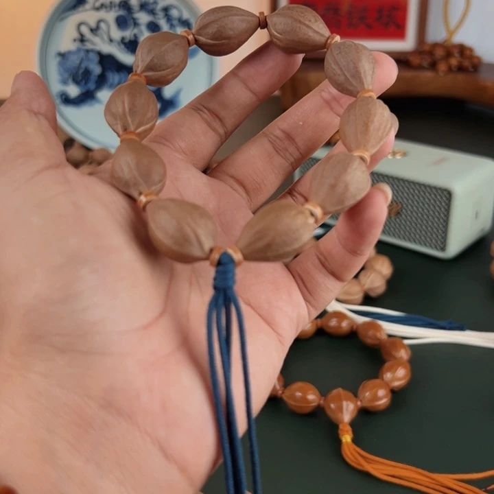 手串橄榄核1626三面佛