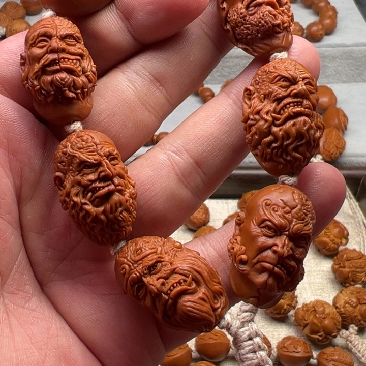 桐***桐手串橄榄核橄榄核雕工艺制作