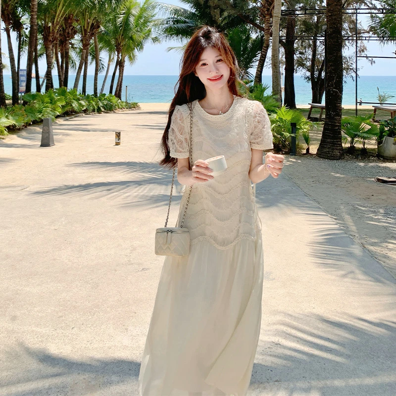 冷淡系高级感薄纱连衣裙女2025新款蕾丝拼接夏日度假绝美a字长裙