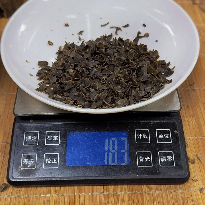 沉香木手把件邢**下海南黑棋沉水切片