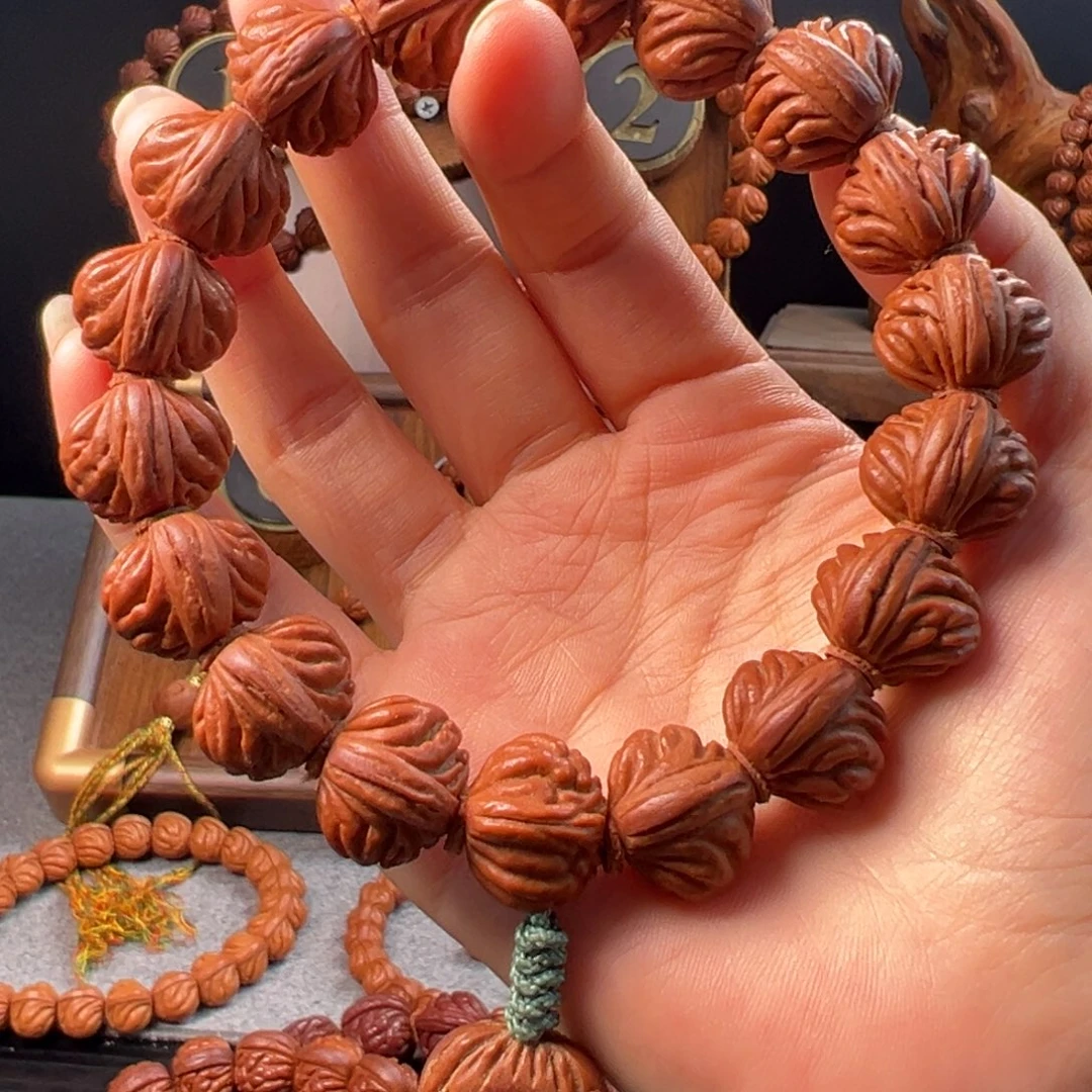 玩***R手串桃核18野生红魔