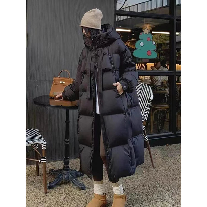 韩版长款过膝连帽羽绒服女飘带白鸭绒2024冬季新款保暖面包服外套