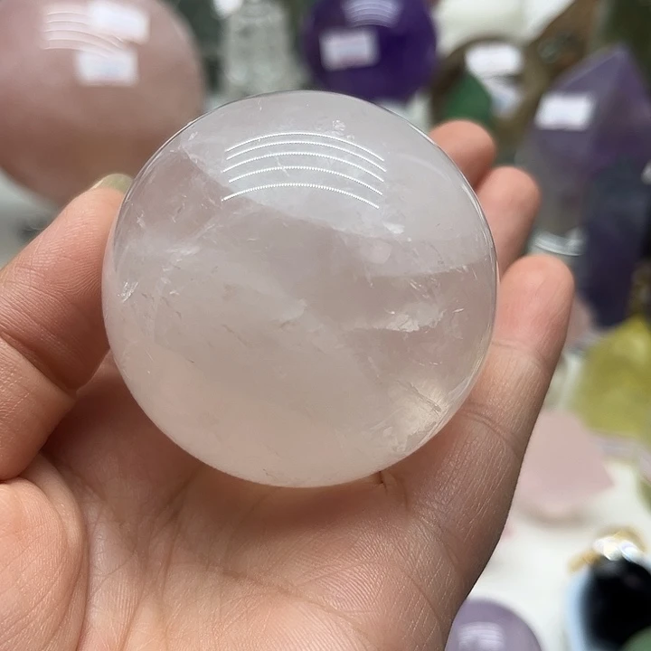 沐***林水晶珠宝半成品未镶嵌248克粉水晶球