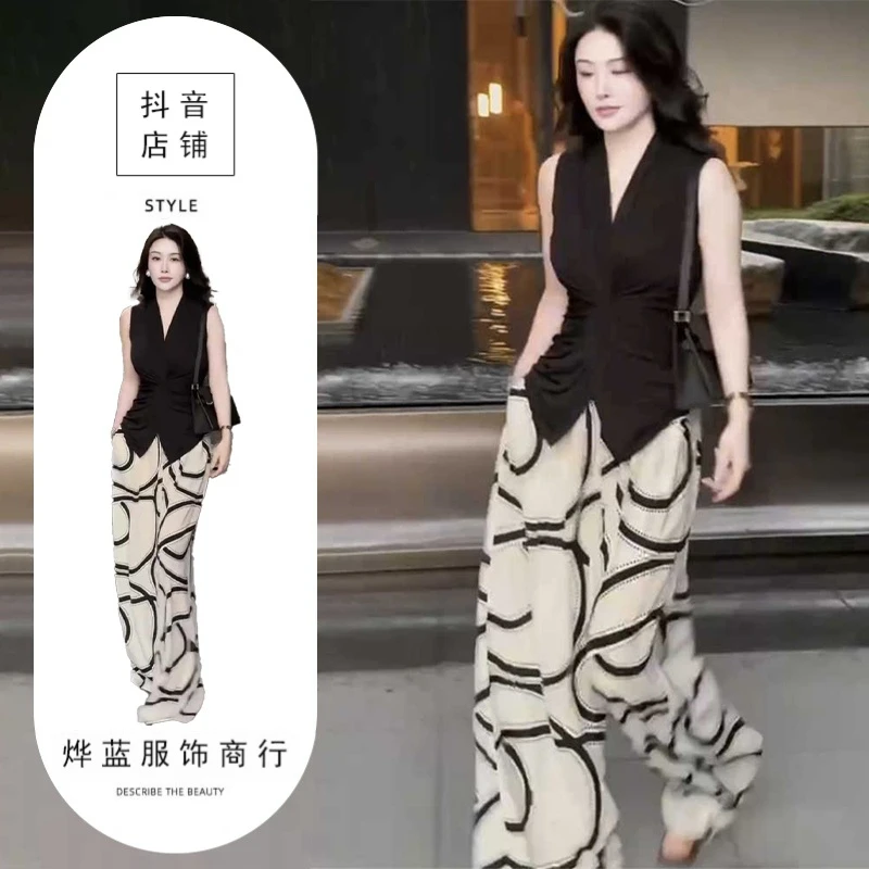 高级感气质女装2025年夏季新款V领砍袖交叉上衣条纹阔腿裤套装潮
