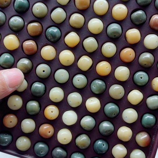 白玉菩提吊坠瑕疵12-10多宝汉堡100颗