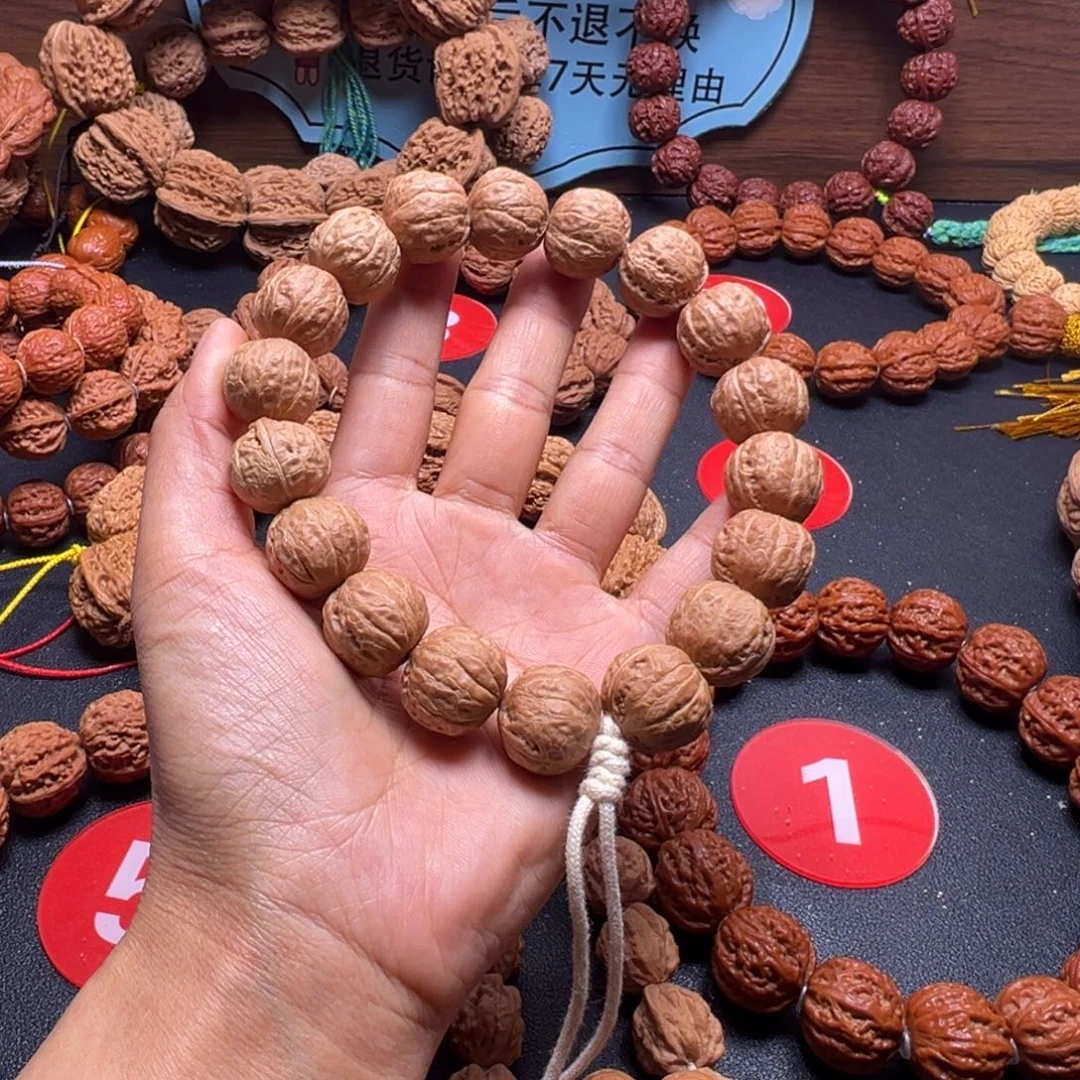 舜****文玩核桃吊坠野生小核桃17加
