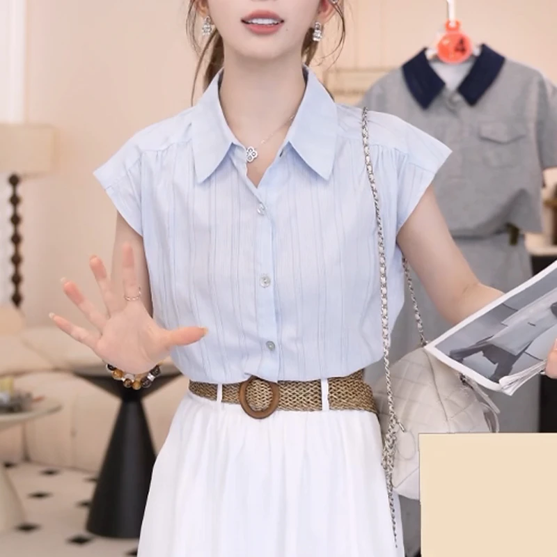 2025年夏季新款翻领单排多口短袖衬衫女时尚百搭减龄气质显瘦上衣