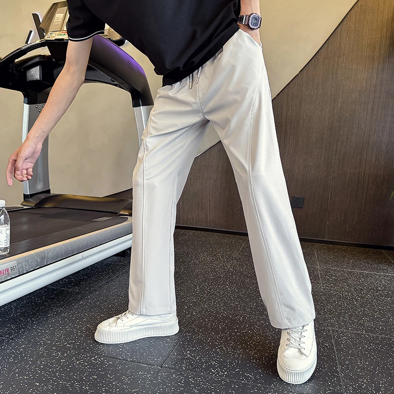 网眼透气打孔冰丝裤子男款夏季直筒速干运动裤美式斜切休闲微喇裤