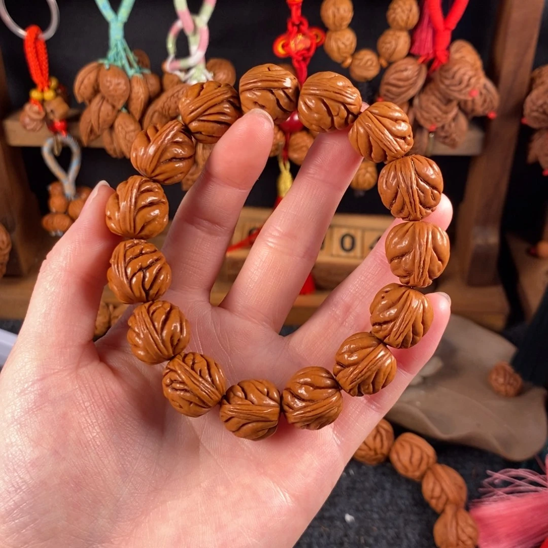 吊坠桃核桃枭手串