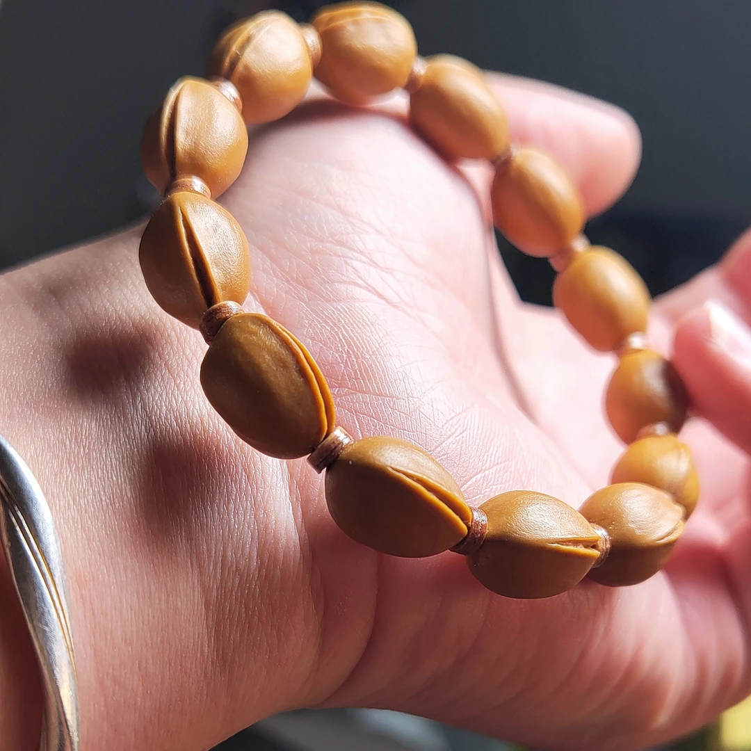 六脉传承核雕开心果橄榄核雕刻老油核小籽文玩手串创意素核开心果