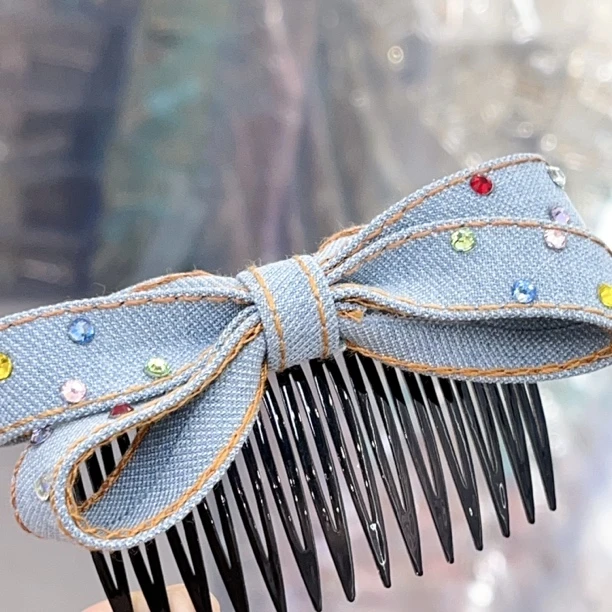 D645浅牛仔蝴蝶结插梳