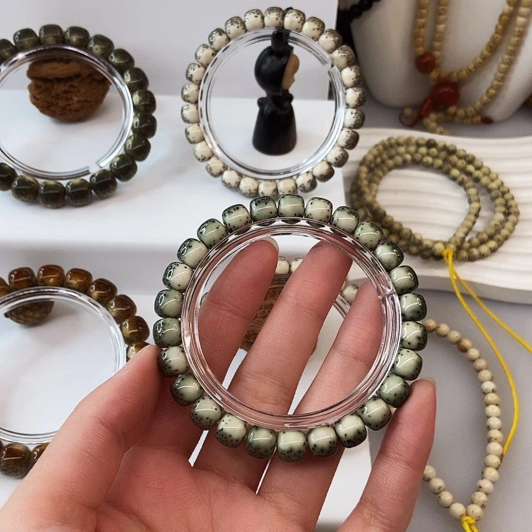 小***_星月菩提手串卡9绿背河豚m77